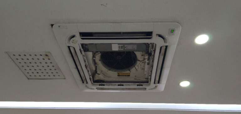 Internal dust buildup showing the need for AC duct cleaning.